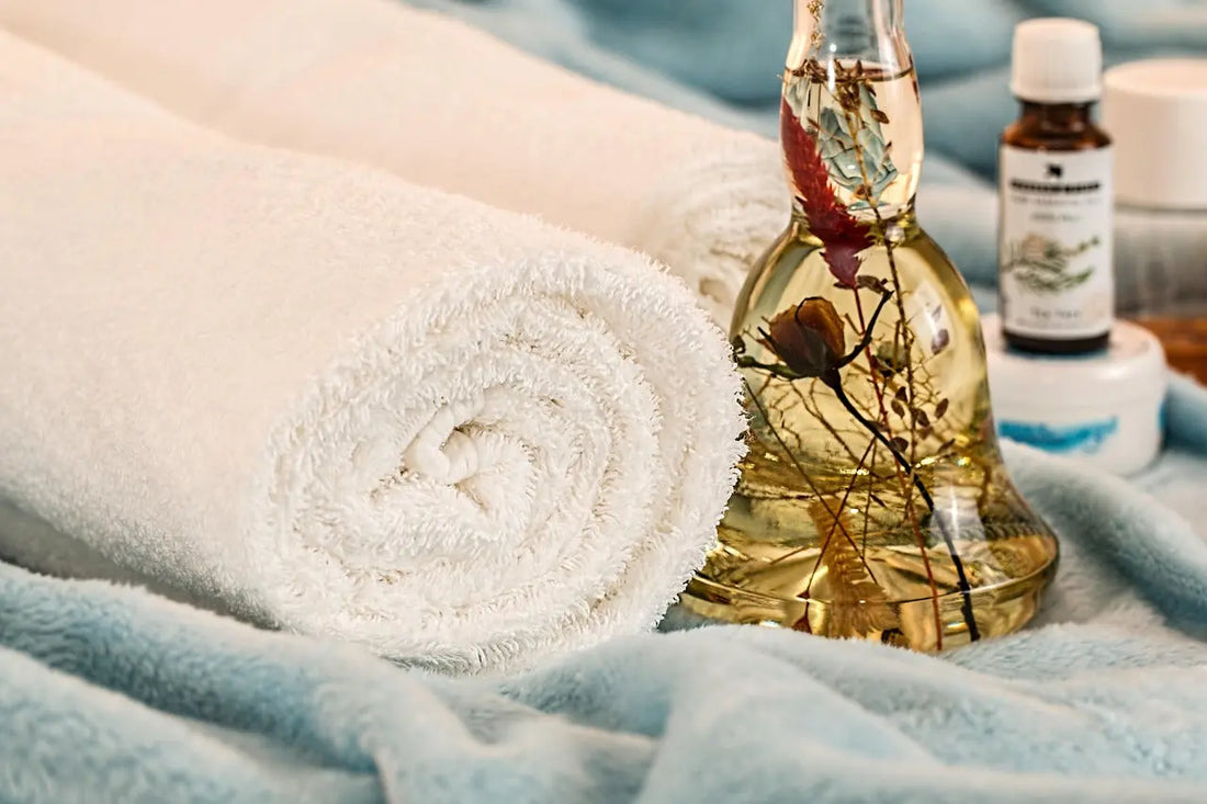Image of towel and oil ready for spa used in the self-care gifts for her McCuddles blog. 