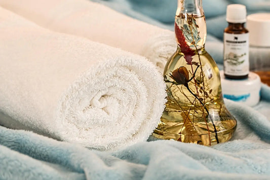Image of towel and oil ready for spa used in the self-care gifts for her McCuddles blog. 