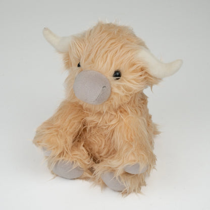 Marmalade the weighted Highland cow plush for anxiety relief and heat therapy.